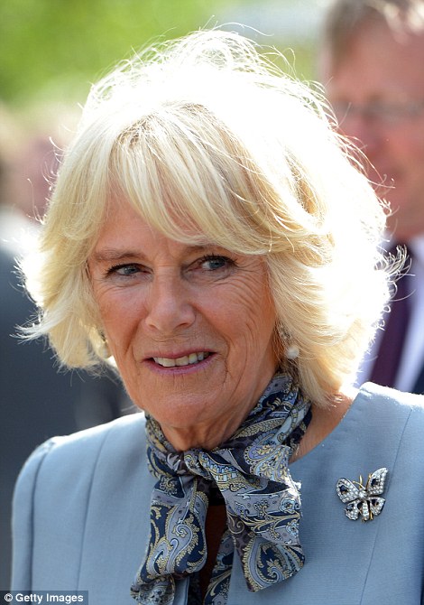 28D5342A00000578-3086721-Camilla_wore_a_patterned_silk_scarf_and_a_butterfly_brooch-a-78_1431980639379