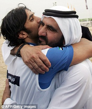 2C7ED7D700000578-3240937-Close_Dubai_ruler_Sheikh_Mohammad_bin_Rashed_Al_Maktoum_right_hu-m-44_1442672070836
