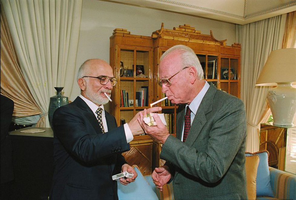 800px-Flickr_-_Government_Press_Office_(GPO)_-_King_Hussein_of_Jordan_lights_P.M.Yitzhak_Rabin's_cigarette_at_royal_residence_in_Akaba