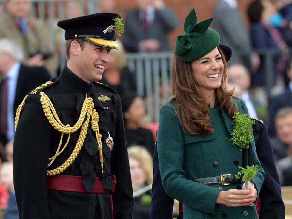 Britain's Prince William and Catherine, Duchess of Cambridge wear sprigs of shamrock during a visit to the 1st Battalion Irish Guards for a St Patrick's Day Parade at Mons Barracks in Aldershot