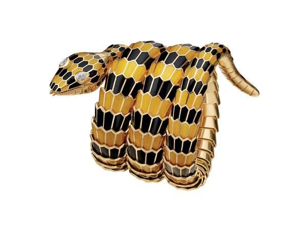 "Snake" bracelet-watch in gold with yellow and black enamel and diamonds, ca 1968
