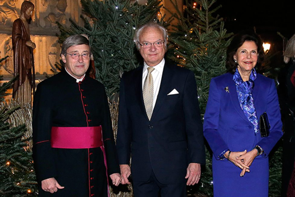 Queen Silvia and King Carl Gustaf of Sweden attending the Lucia concert in Notre Dame in Paris.