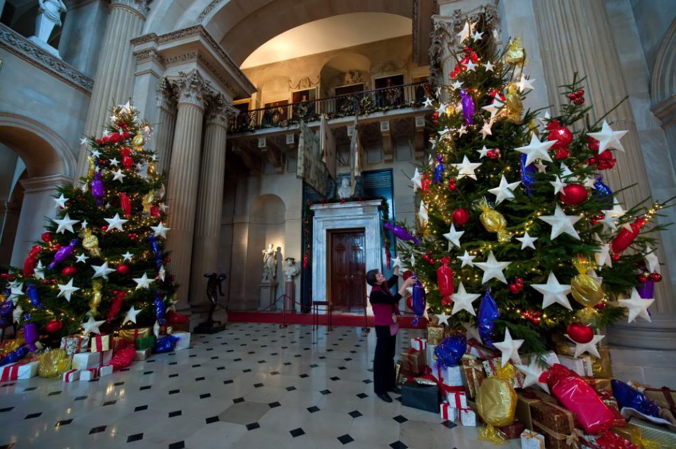 Twinkling Christmas trees in the Great Hall at Blenheim Palace