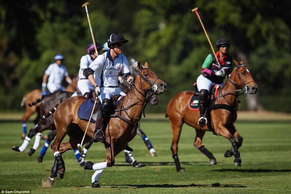 4DB9CA2C00000578-5904175-Prince_Harry_pictured_in_the_foreground_showed_off_his_skills_at-a-11_1530376205936