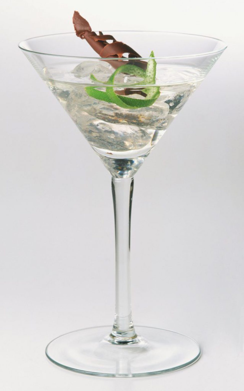 Nureyev, a vodka cocktail served in classic martini cocktail glass decorated with lime and chocolate shavings.