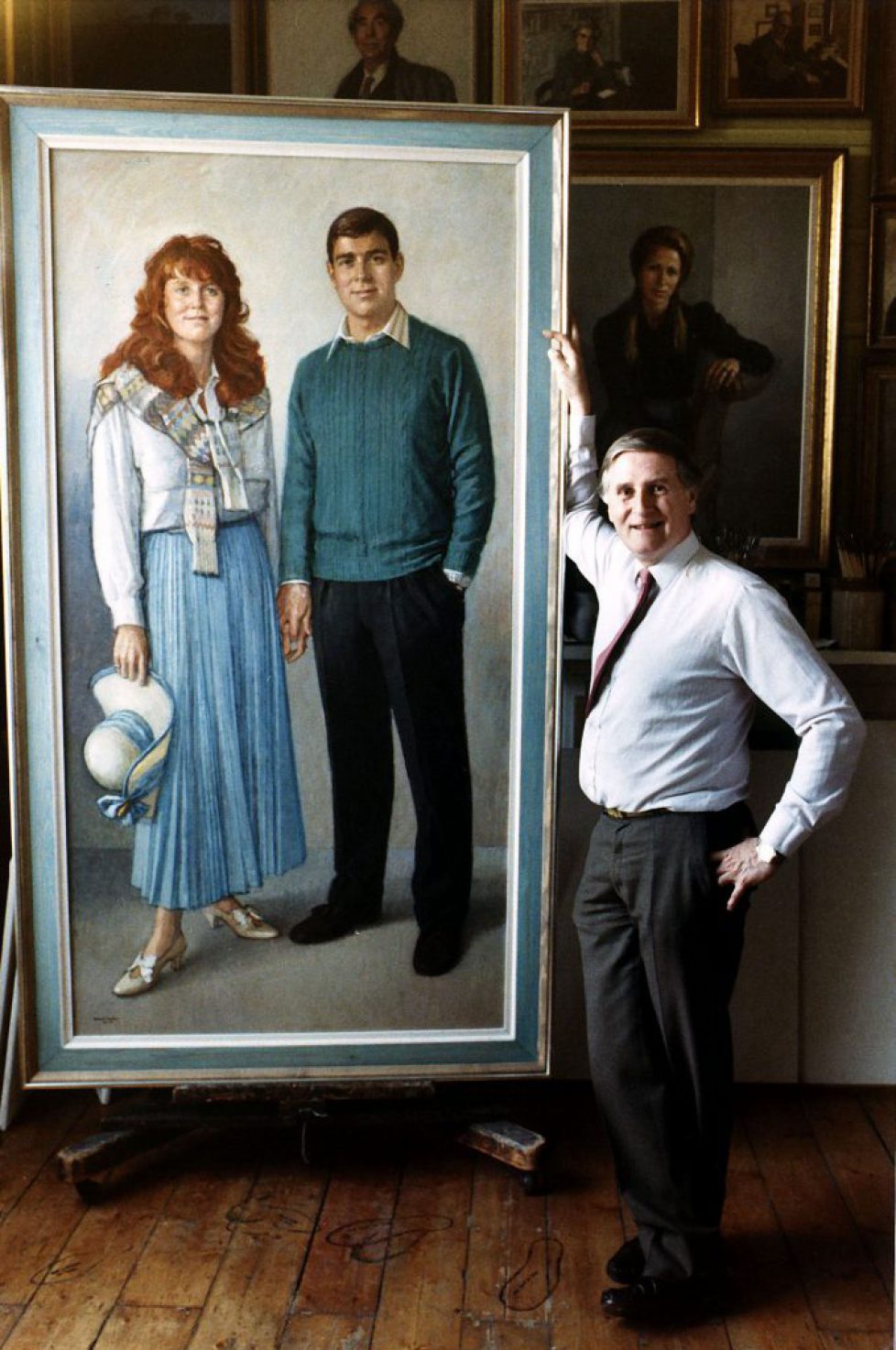 Michael Noakes Royal portrait painter standing in front of his portrait of the Duke and Duchess of York 1988