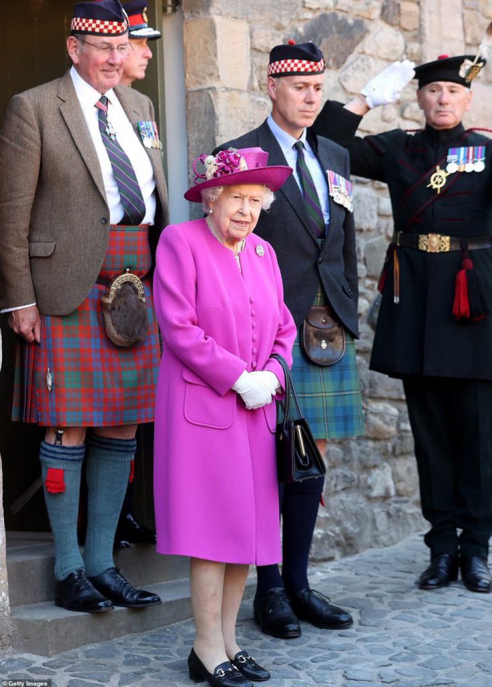 44822295-9736779-The_Queen_met_with_members_of_staff_during_the_opening_of_the_th-m-44_1624980046759