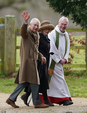 80828007-13043573-King_Charles_and_Queen_Camilla_looked_in_high_spirits_as_they_wa-m-16_1707046400398