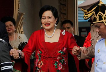 FILE PHOTO: Thailand's Queen Sirikit arrives in Chinatown for Lunar New Year celebrations in Bangkok