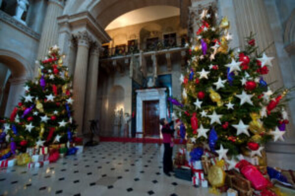 Twinkling Christmas trees in the Great Hall at Blenheim Palace