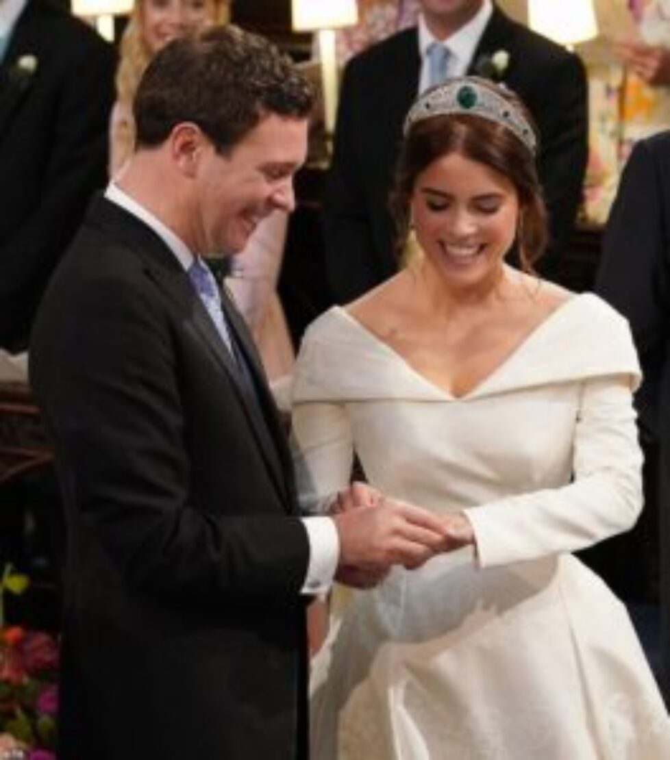 4986250-6268487-The_happy_couple_Jack_and_Eugenie_have_wide_smiles_as_they_excha-a-28_1539341487088
