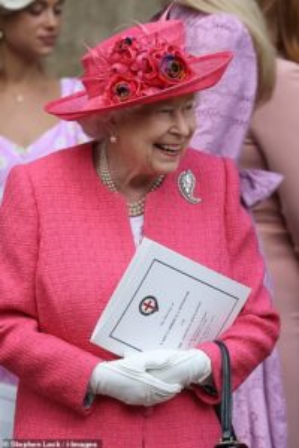 13655822-7043855-The_Queen_looked_overjoyed_as_she_beamed_outside_St_George_s_cha-m-297_1558184654773