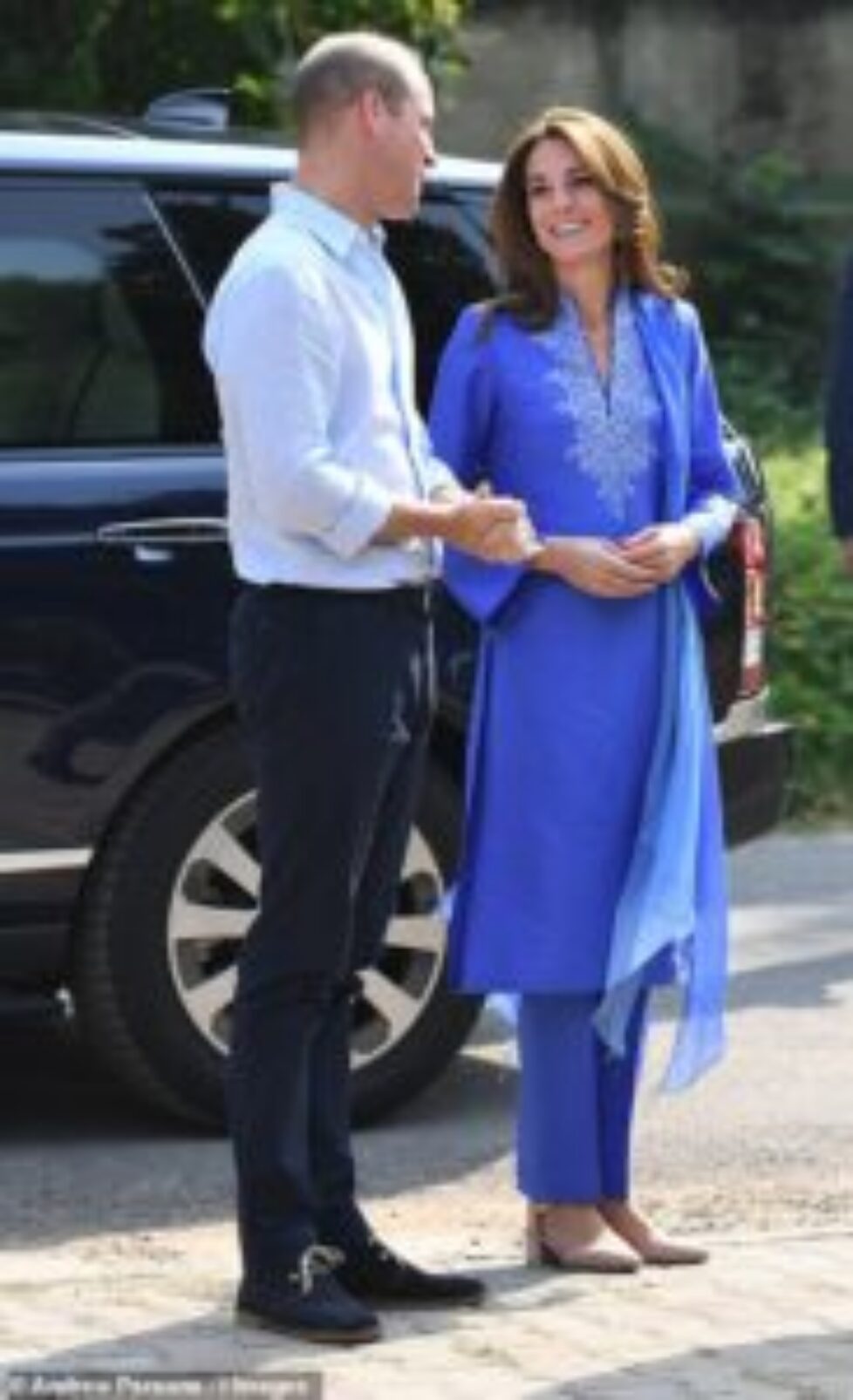 19725030-7573891-The_couple_are_visiting_the_Islamabad_Model_College_for_Girls_in-a-41_1571118482011