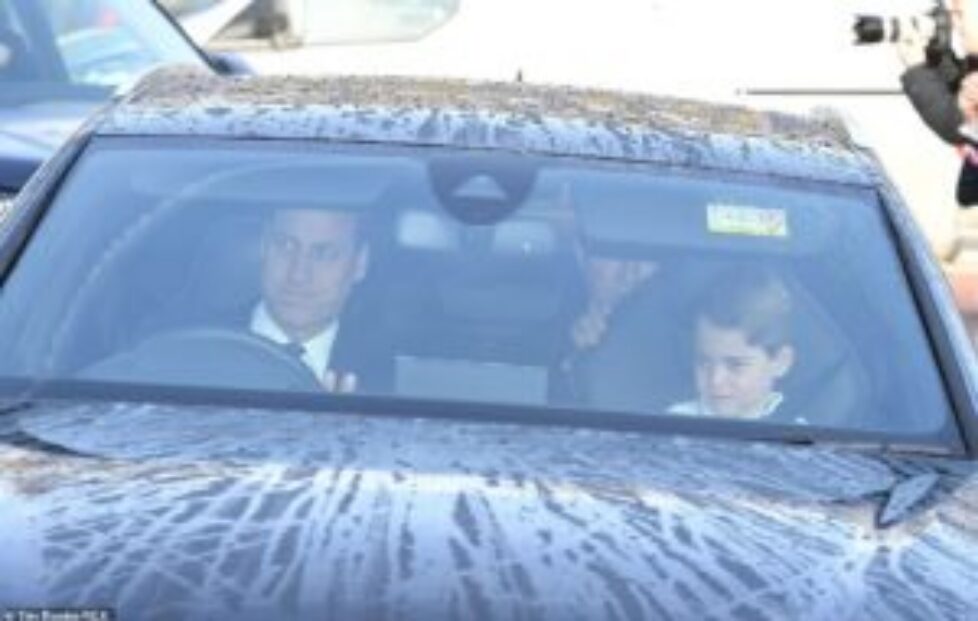 22398148-7805503-Prince_William_smiles_as_he_sits_alongside_Prince_George_in_the_-a-61_1576672933350