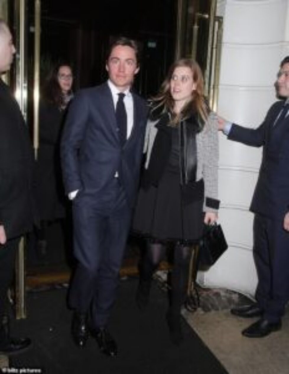 25571132-8078017-Princess_Beatrice_who_are_a_short_black_dress_tweed_cropped_jack-a-3_1583411055724