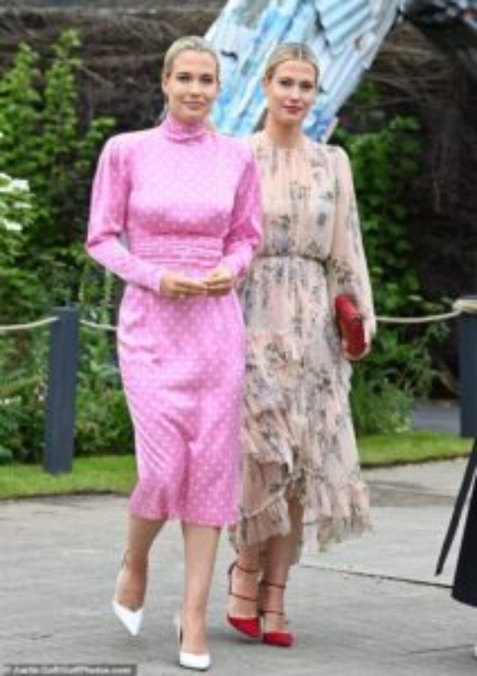 71264007-12110849-Lady_Eliza_Spencer_left_and_Lady_Amelia_Spencer_wore_striking_su-a-38_1684763607647
