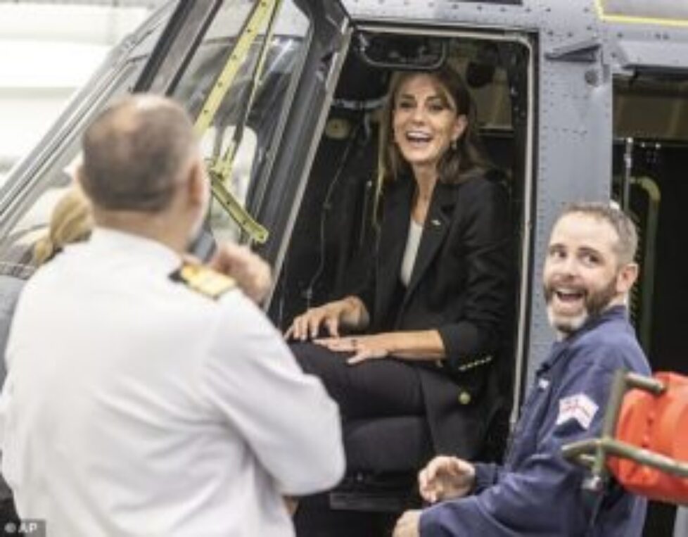 75559263-12530851-The_Princess_of_Wales_sat_in_a_training_version_of_a_Royal_Navy_-m-43_1695050686569